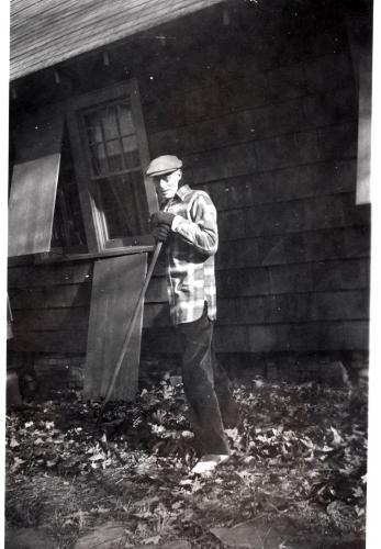 1945 December Dad Davids with window shutters